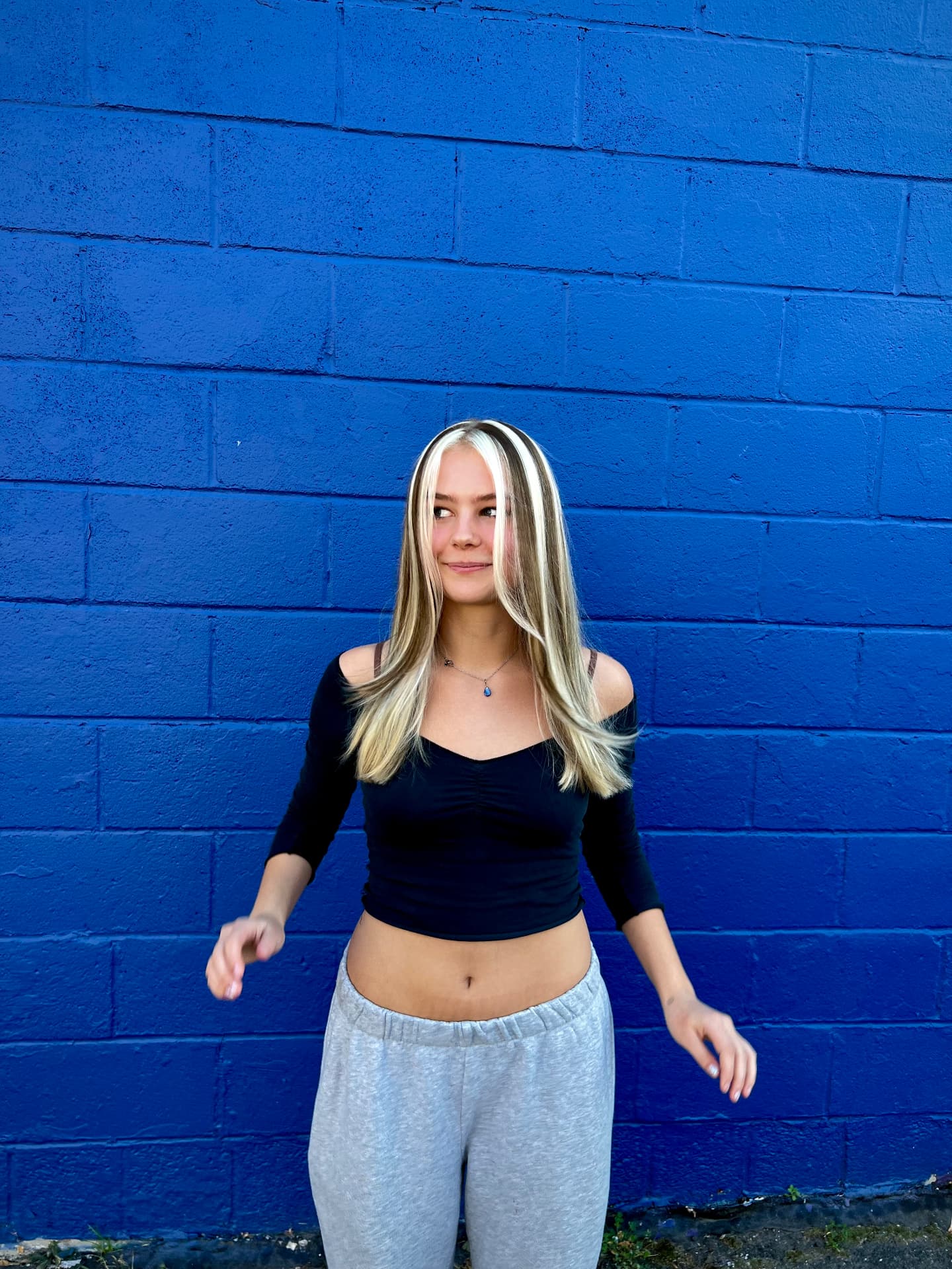 Blonde money-piece highlights with sleek finish